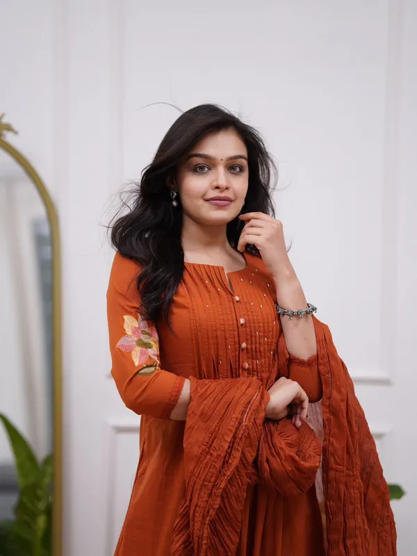 Women's_Rust_Orange_Embroidered_A-Line_Kurta_with_Pintuck_Yoke_&_Floral_Sleeve_Detailing_.