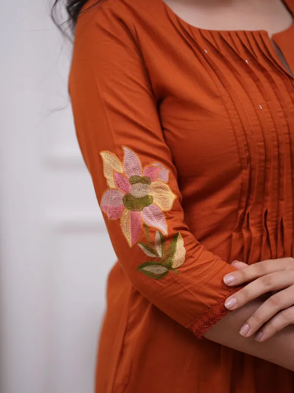 Women's_Rust_Orange_Embroidered_A-Line_Kurta_with_Pintuck_Yoke_&_Floral_Sleeve_Detailing_.