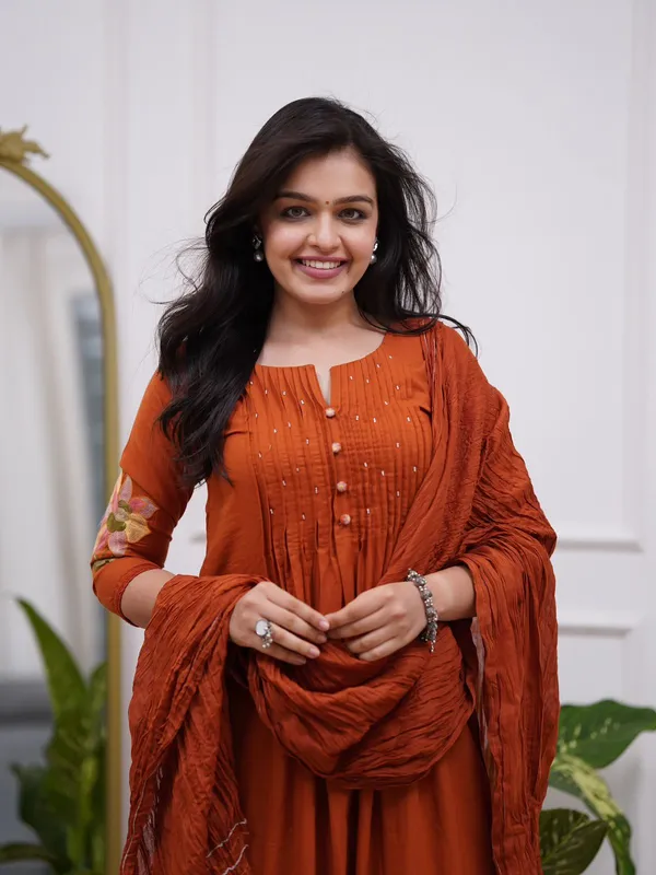 Women's_Rust_Orange_Embroidered_A-Line_Kurta_with_Pintuck_Yoke_&_Floral_Sleeve_Detailing_.