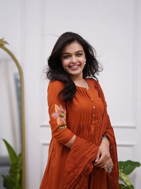Women's_Rust_Orange_Embroidered_A-Line_Kurta_with_Pintuck_Yoke_&_Floral_Sleeve_Detailing_.