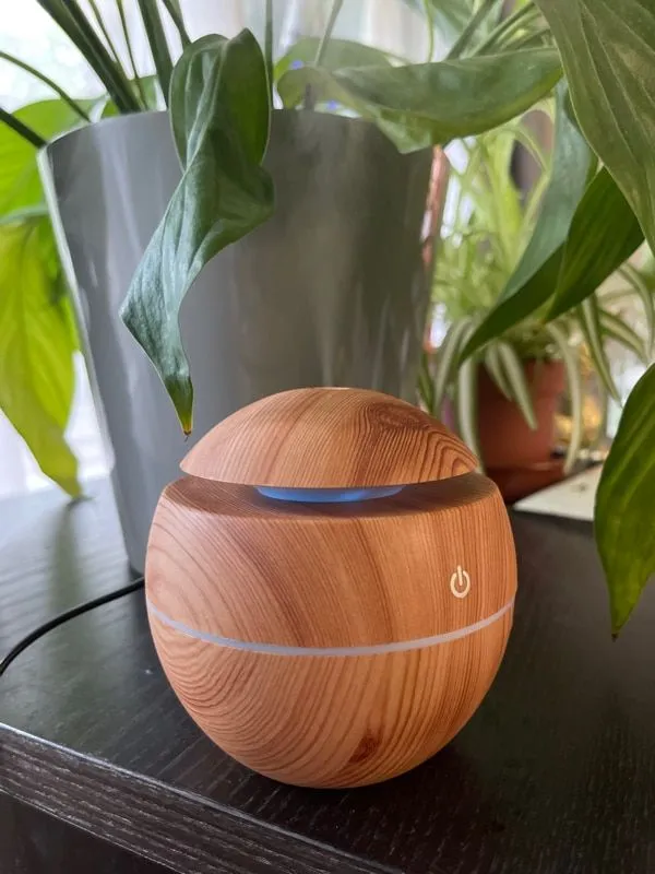 Brown_Wooden_Round_Cool_Mist_Aroma_Humidifier_And_Essential_Oil_Diffuser