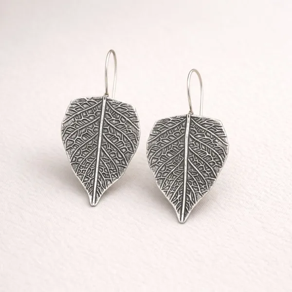 Silver_Celestial_Leaf_Oxidised_Textured_Drop_Earrings_For_Women_Brass_Drops_And_Danglers