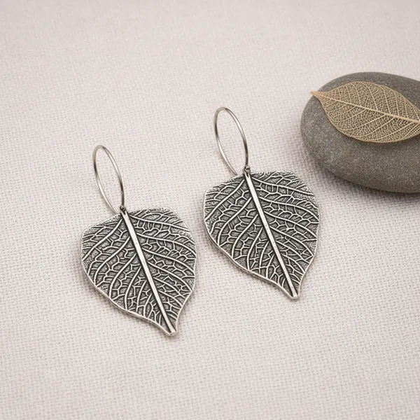 Silver_Celestial_Leaf_Oxidised_Textured_Drop_Earrings_For_Women_Brass_Drops_And_Danglers