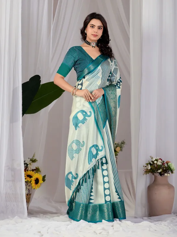 Off-White_&_Teal_Elephant_Print_Soft_Lichi_Silk_Saree_with_Woven_Border_&_Contrast_Blouse