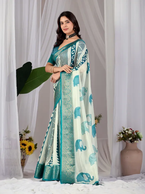 Off-White_&_Teal_Elephant_Print_Soft_Lichi_Silk_Saree_with_Woven_Border_&_Contrast_Blouse