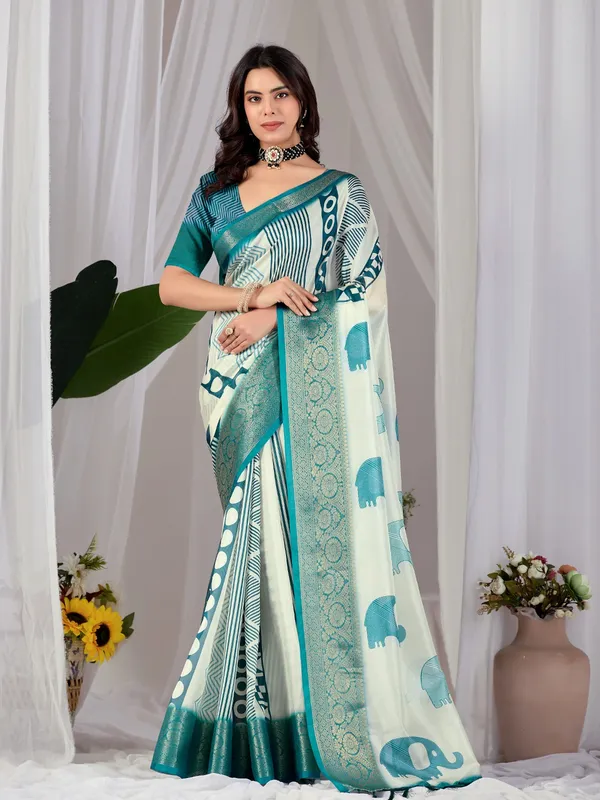 Off-White_&_Teal_Elephant_Print_Soft_Lichi_Silk_Saree_with_Woven_Border_&_Contrast_Blouse