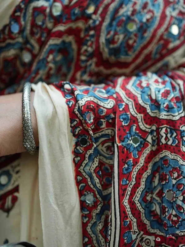 Ivory_Ajrakh_Print_Soft_Silk_Saree_with_Mirror_Work_&_Designer_Border