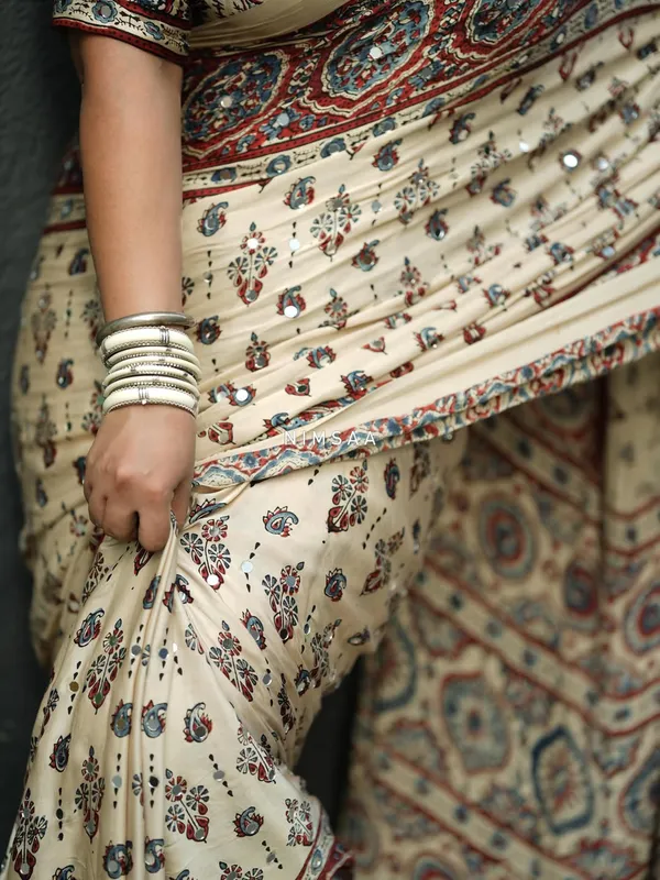 Ivory_Ajrakh_Print_Soft_Silk_Saree_with_Mirror_Work_&_Designer_Border