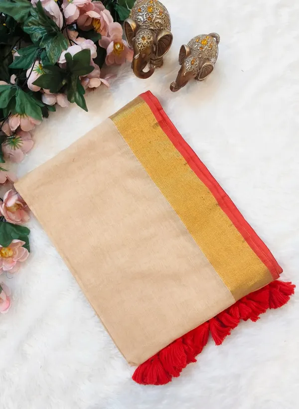 Beige_Cotton_Saree_With_Golden_Border_And_Red_Tassel_Trim