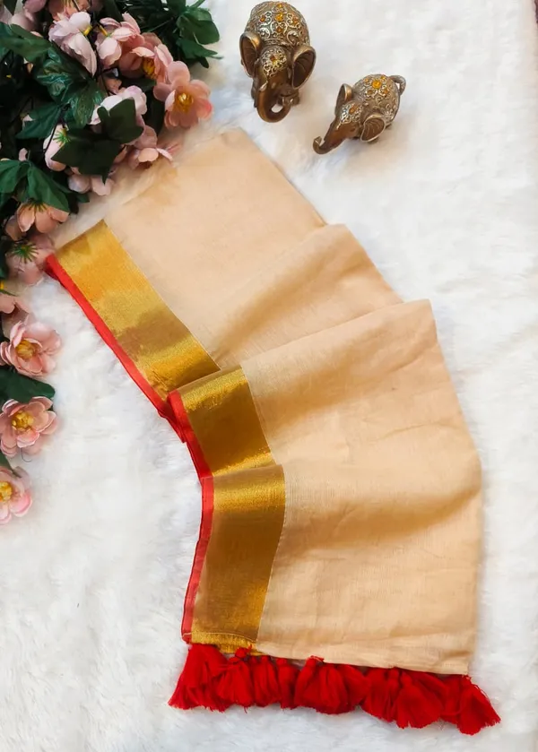 Beige_Cotton_Saree_With_Golden_Border_And_Red_Tassel_Trim