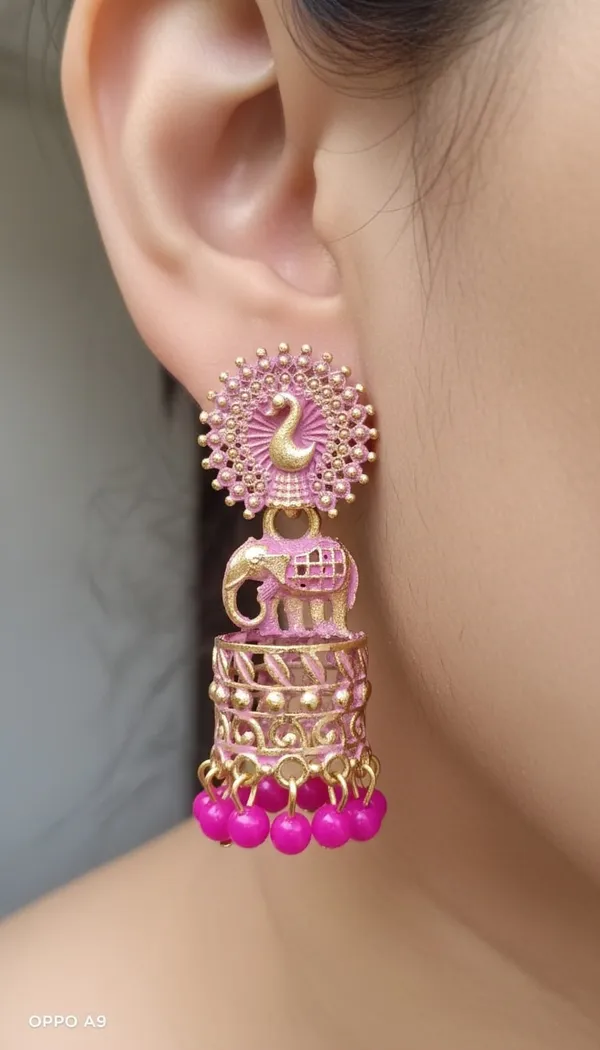 Gold_Tone_Peacock_And_Elephant_Motif_Jhumka_Earrings_Pink_Bead_Drops.