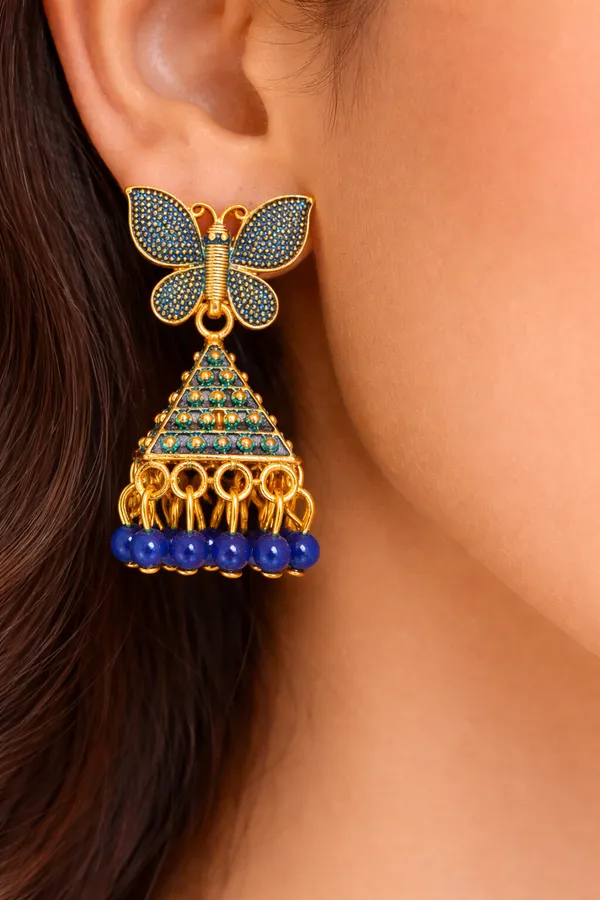 Elegant_butterfly_blue_and_gold_dangling_earrings_adorned_with_sparkling_stones_and_royal_blue_bead_accents