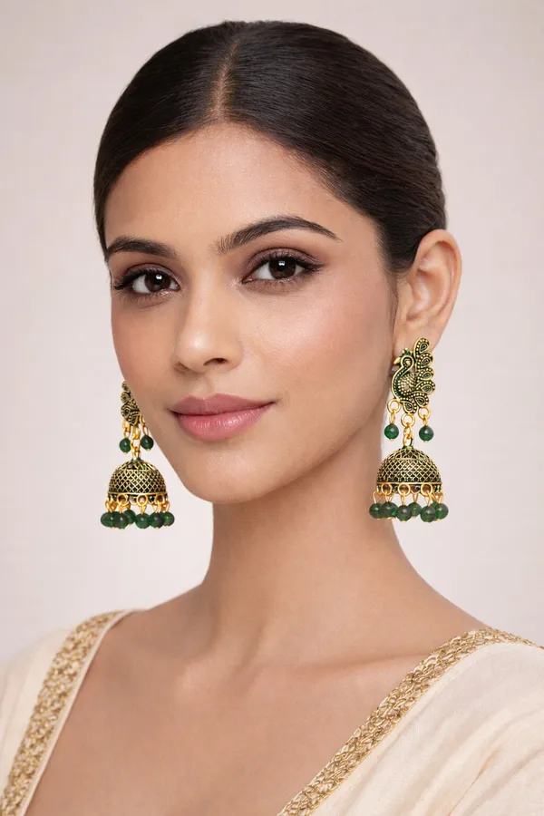 Elegant_peacock-inspired_Green_and_gold_jhumka_earrings_adorned_with_intricate_detailing_and_Green_bead_accents