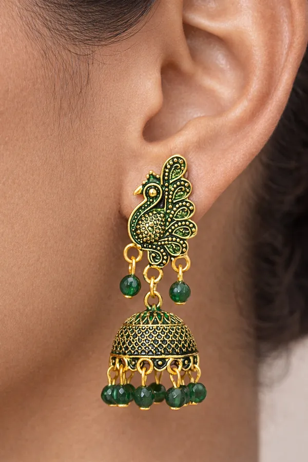 Elegant_peacock-inspired_Green_and_gold_jhumka_earrings_adorned_with_intricate_detailing_and_Green_bead_accents