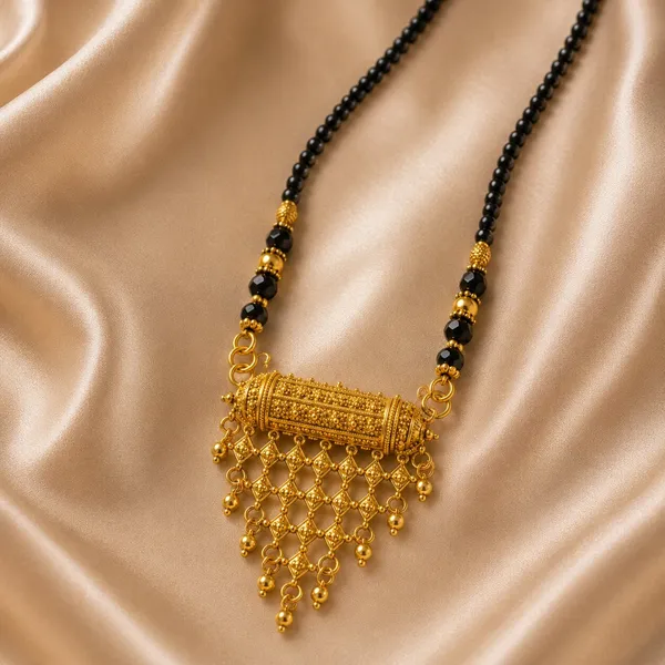 Traditional_gold-tone_mangalsutra_with_twin_black_bead_chains,