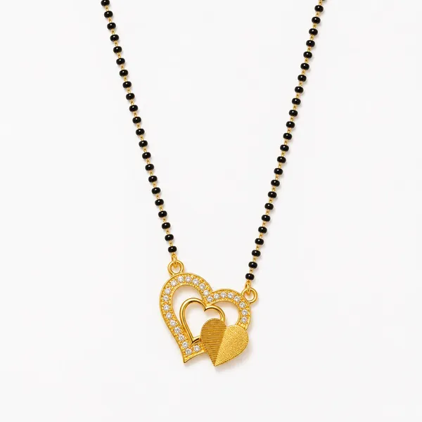Elegant_gold-tone_mangalsutra_with_twin_black_bead_chains_and_a_sparkling_heart-shaped_pendant