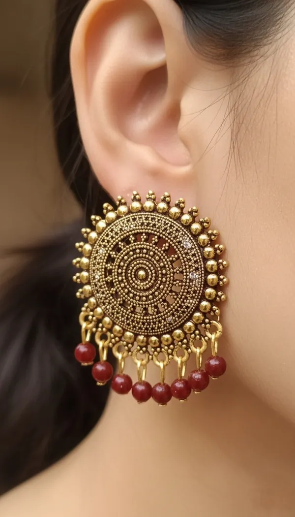 Gold_Tone_Textured_Earrings_With_Red_Bead_Danglers