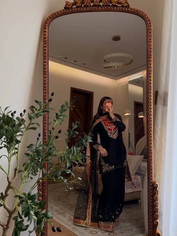 Elegant_Black_Embroidered_Salwar_Suit_With_Red_Yoke_And_Golden_Embellishments