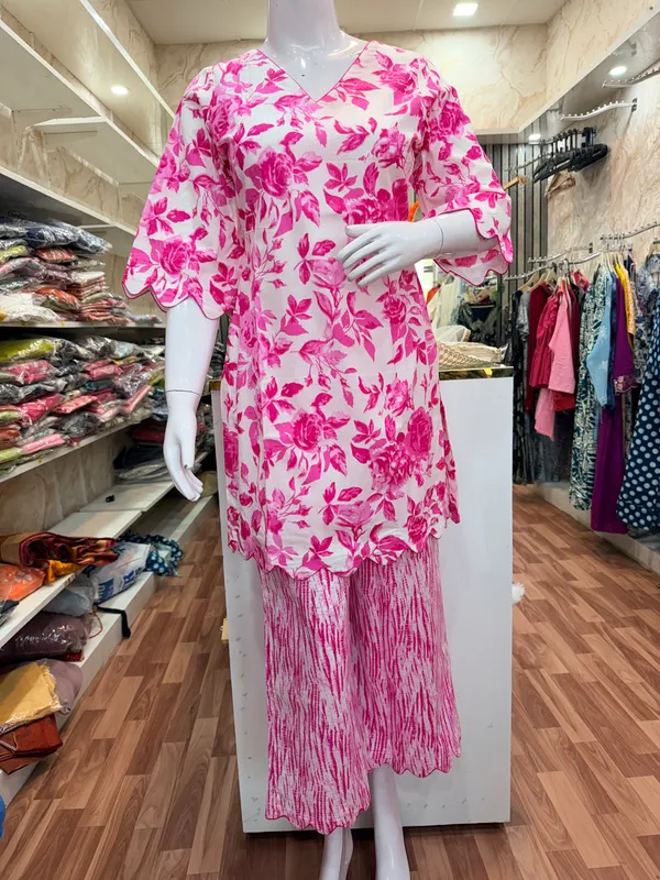 Pink_And_White_Elegant_Design_Short_Kurti_With_Plazo_For_Women