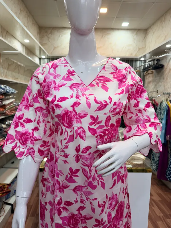 Pink_And_White_Elegant_Design_Short_Kurti_With_Plazo_For_Women