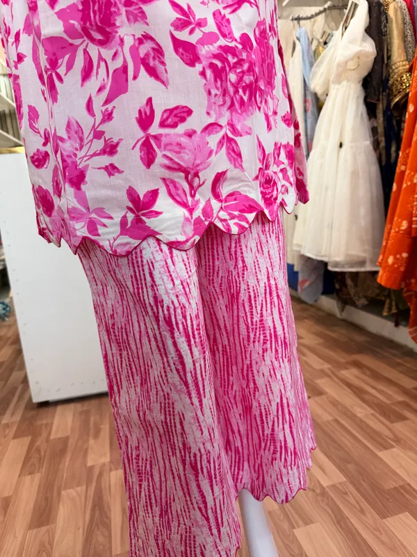 Pink_And_White_Elegant_Design_Short_Kurti_With_Plazo_For_Women