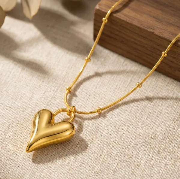 Gold_Steel_Cubic_Zirconia_Heart_Charm_Pendant_For_Women