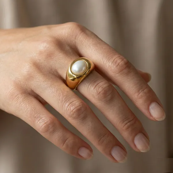 Gold_Steel_Dome_Ring_With_White_Oval_Inlay_For_Women