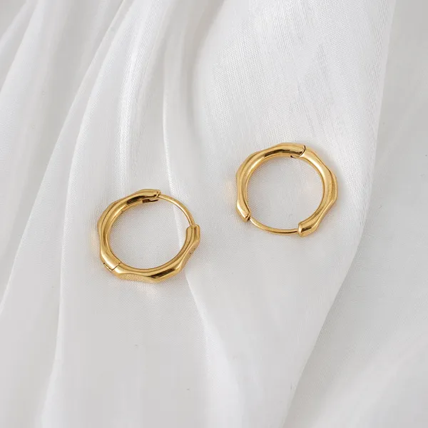 Gold_Steel_Wavy_Huggie_Hoop_Earrings_For_Women
