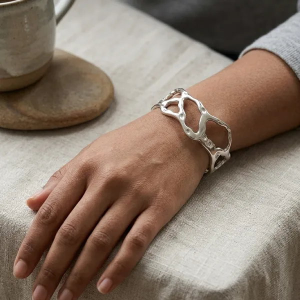 Gold_Steel_Sculptural_Open_Cuff_Bracelet_For_Women