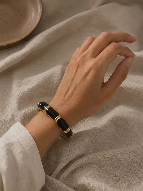 Selene_Black_&_Gold_Segment_Hinge_Bangle