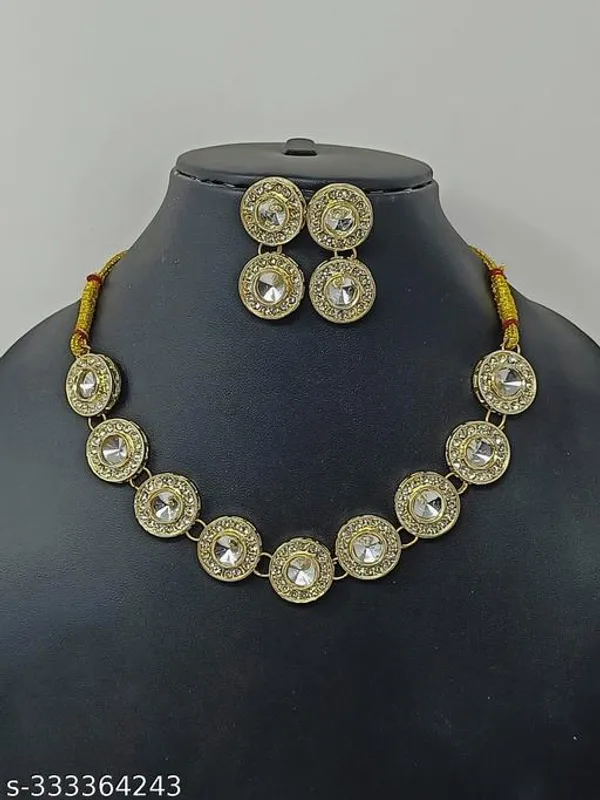 Traditional_Gold_Plated_Circular_Necklace_Set_With_Clear_Gemstones_Matching_Earrings_Ornate_Bridal_Jewellery_With_Red_Thread_Accents_Perfect_For_Weddings_Parties_Festive_Wear_Premium_Gifting_Elegant_Ethnic_Design_With_Sparkling_Stones