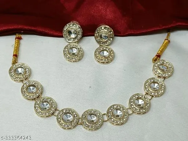Traditional_Gold_Plated_Circular_Necklace_Set_With_Clear_Gemstones_Matching_Earrings_Ornate_Bridal_Jewellery_With_Red_Thread_Accents_Perfect_For_Weddings_Parties_Festive_Wear_Premium_Gifting_Elegant_Ethnic_Design_With_Sparkling_Stones
