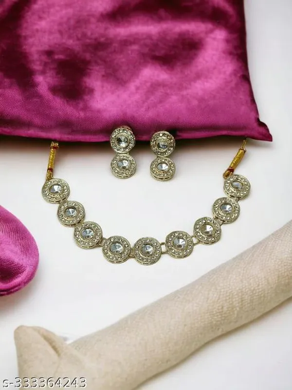 Traditional_Gold_Plated_Circular_Necklace_Set_With_Clear_Gemstones_Matching_Earrings_Ornate_Bridal_Jewellery_With_Red_Thread_Accents_Perfect_For_Weddings_Parties_Festive_Wear_Premium_Gifting_Elegant_Ethnic_Design_With_Sparkling_Stones
