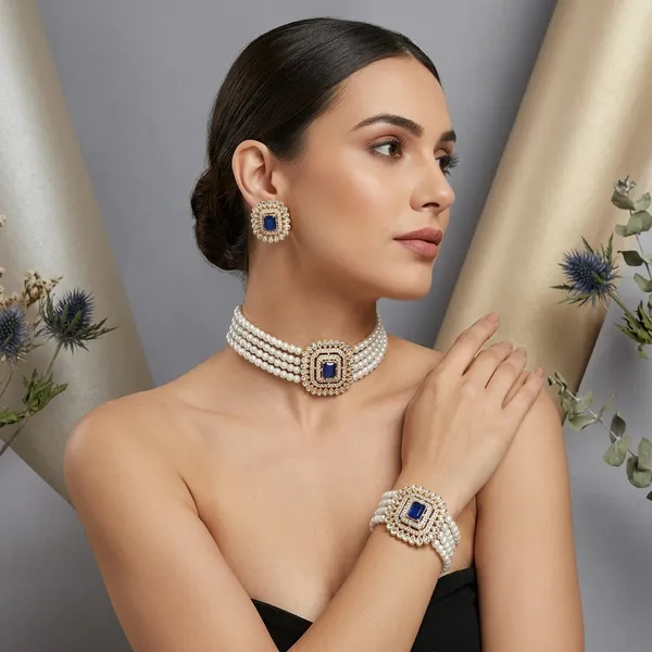 Blue_Gemstone_Pearl_Bracelet_Earrings_Set_Premium_Designer_Jewellery_With_Square_Sapphire_Centerpiece_White_Pearl_Strands_Teardrop_Stones_Golden_Finish_Festive_Wedding_Gifting_Collection_For_Women_Luxury_Ethnic_Party_Wear