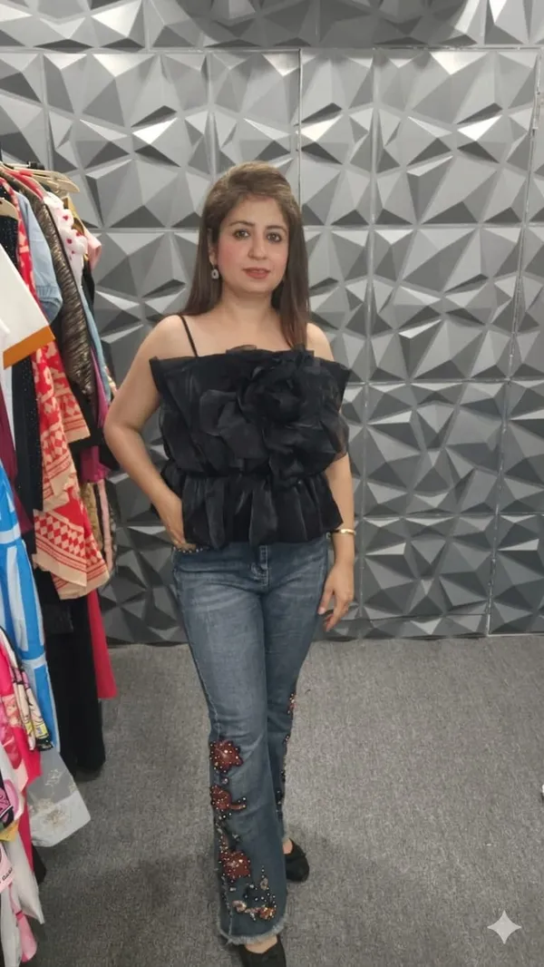 Black_Ruffled_Peplum_Top_With_Embellished_Flared_Jeans