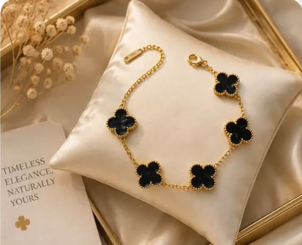 Black_Clover_Charm_Bracelet_–_Gold-Tone_Floral_Bracelet