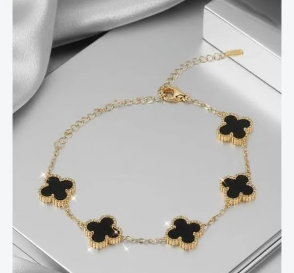 Black_Clover_Charm_Bracelet_–_Gold-Tone_Floral_Bracelet