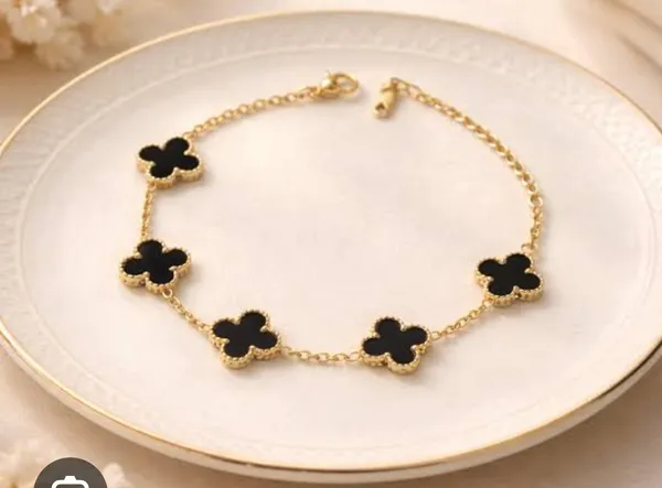 Black_Clover_Charm_Bracelet_–_Gold-Tone_Floral_Bracelet