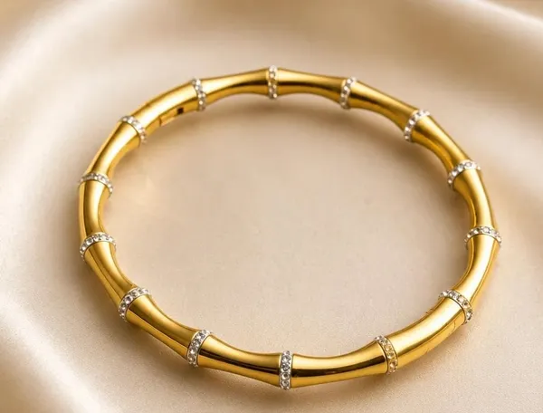 Elegant_Gold-Tone_Crystal_Accent_Bangle_Bracelet_for_Women