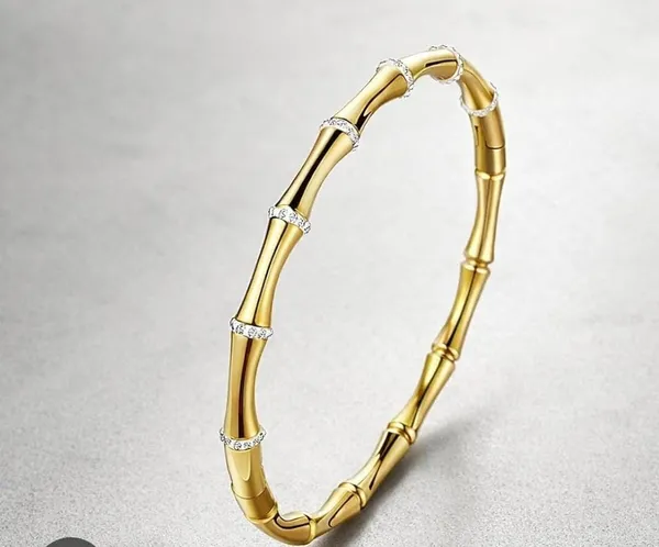 Elegant_Gold-Tone_Crystal_Accent_Bangle_Bracelet_for_Women