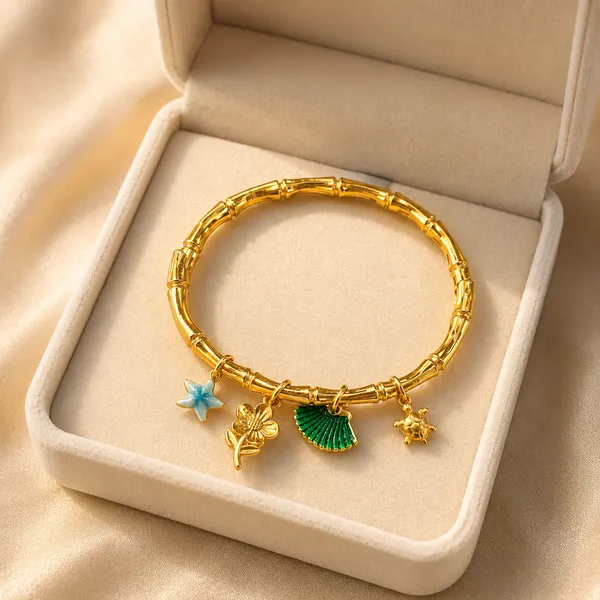 Enchanted_Garden_Gold-Tone_Charm_Bracelet
