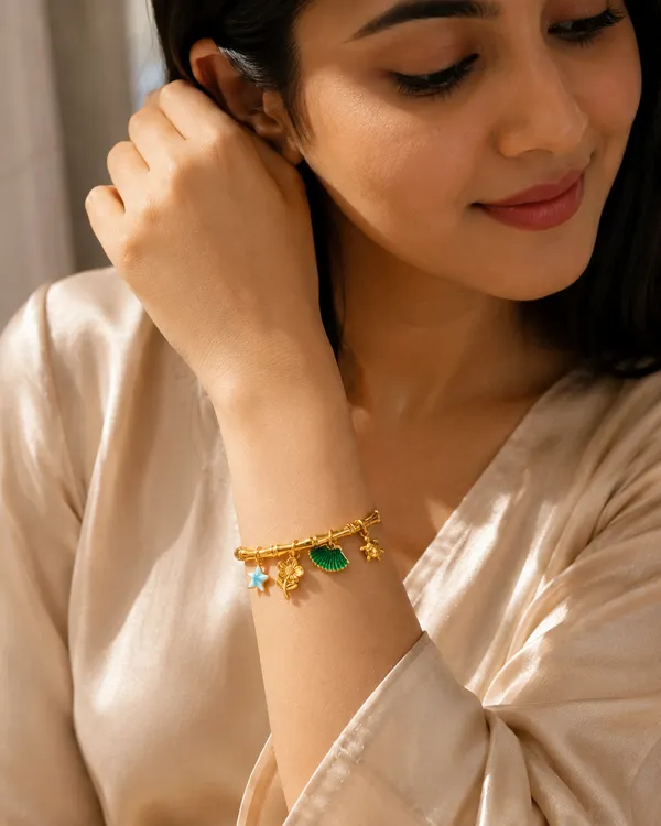 Enchanted_Garden_Gold-Tone_Charm_Bracelet