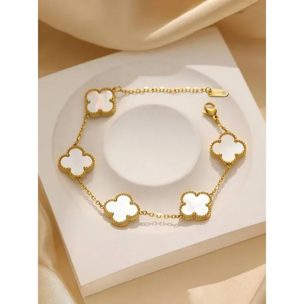 Gold-Tone_Clover_Charm_Bracelet_with_White_Shell-Effect_Stones