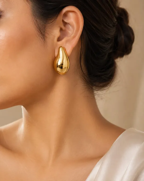 Golden_Teardrop_Statement_Stud_Earrings
