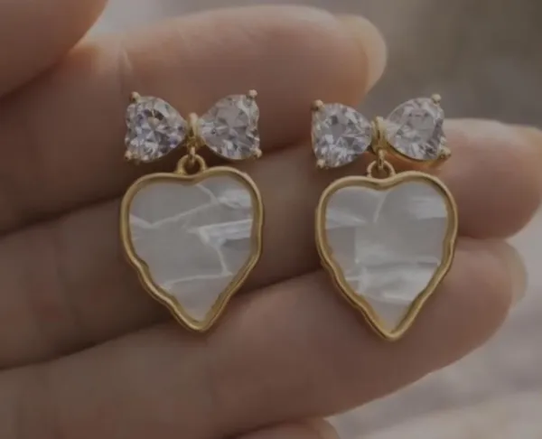 Elegant_Heart_Shaped_White_Stone_Drop_Earrings_With_Crystal_Bow