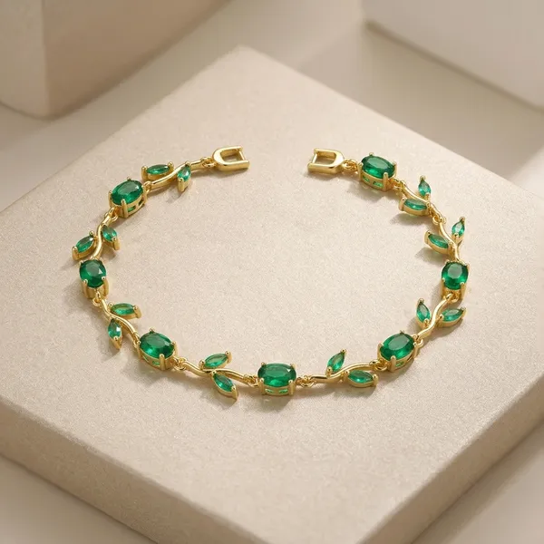 Elegant_Green_Stone_Bracelet_In_Gold_Tone_Setting