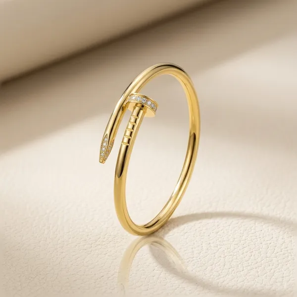 Elegant_Gold_Tone_Nail_Bracelet_With_Diamond_Accents
