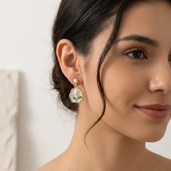 Elegant_Pearl_Flower_Earrings_With_Green_Enamel_Leaves