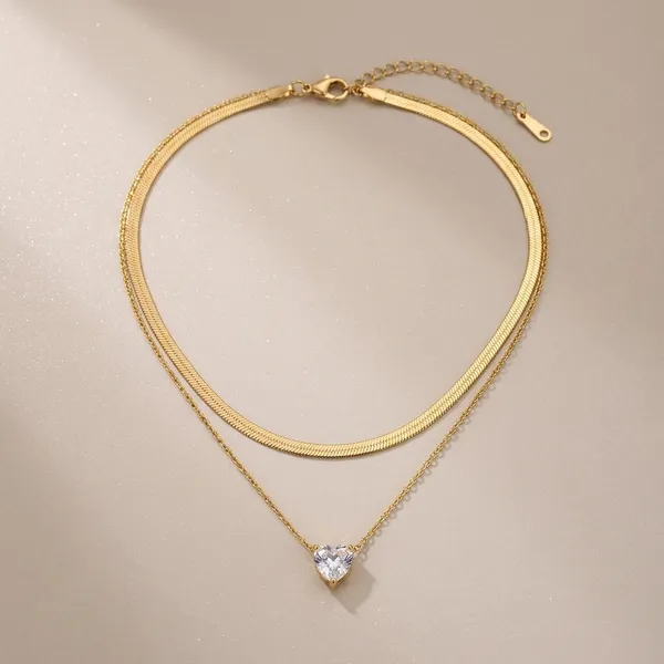 Elegant_Gold_Tone_Chain_Necklace_With_Crystal_Pendant