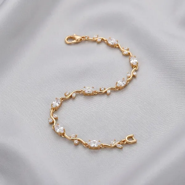 Gold_And_White_Toned_Crystal_Charm_Bracelet
